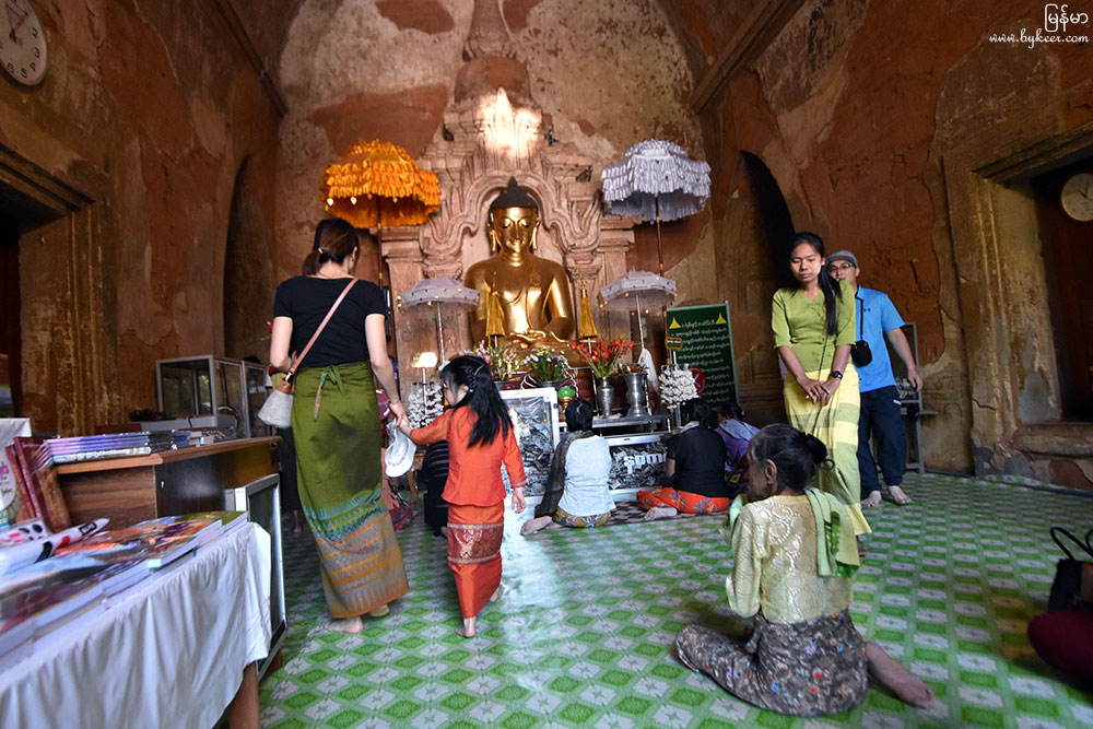 缅甸漫行图记(一)(31): 不同于汉传佛教的藏经塔和舍利塔，缅甸的大型佛塔实为佛寺。<br>巨大的洞穴式佛塔，在烈日炎炎的地带，可为信徒提供一个清凉的跪拜供奉场所。